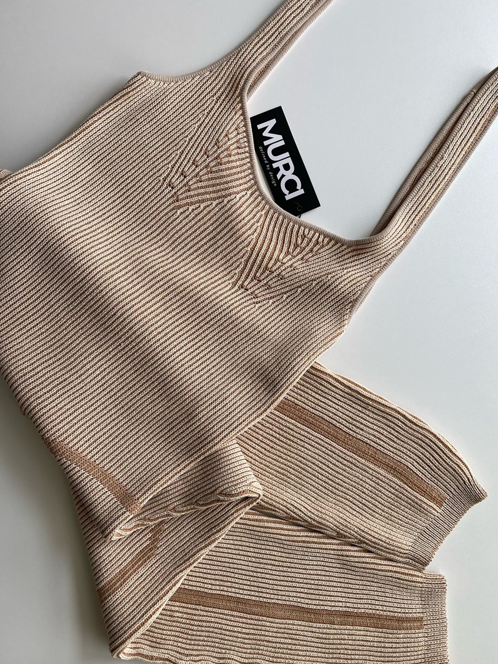 Murci Body Contour Knit Capri Jumpsuit in Beige.